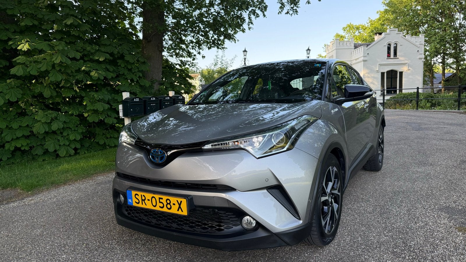 Toyota C-HR 1.8 Hybrid CVT 2018 Grijs, Auto's, 725 kg, 4 cilinders, 122 pk, Origineel Nederlands