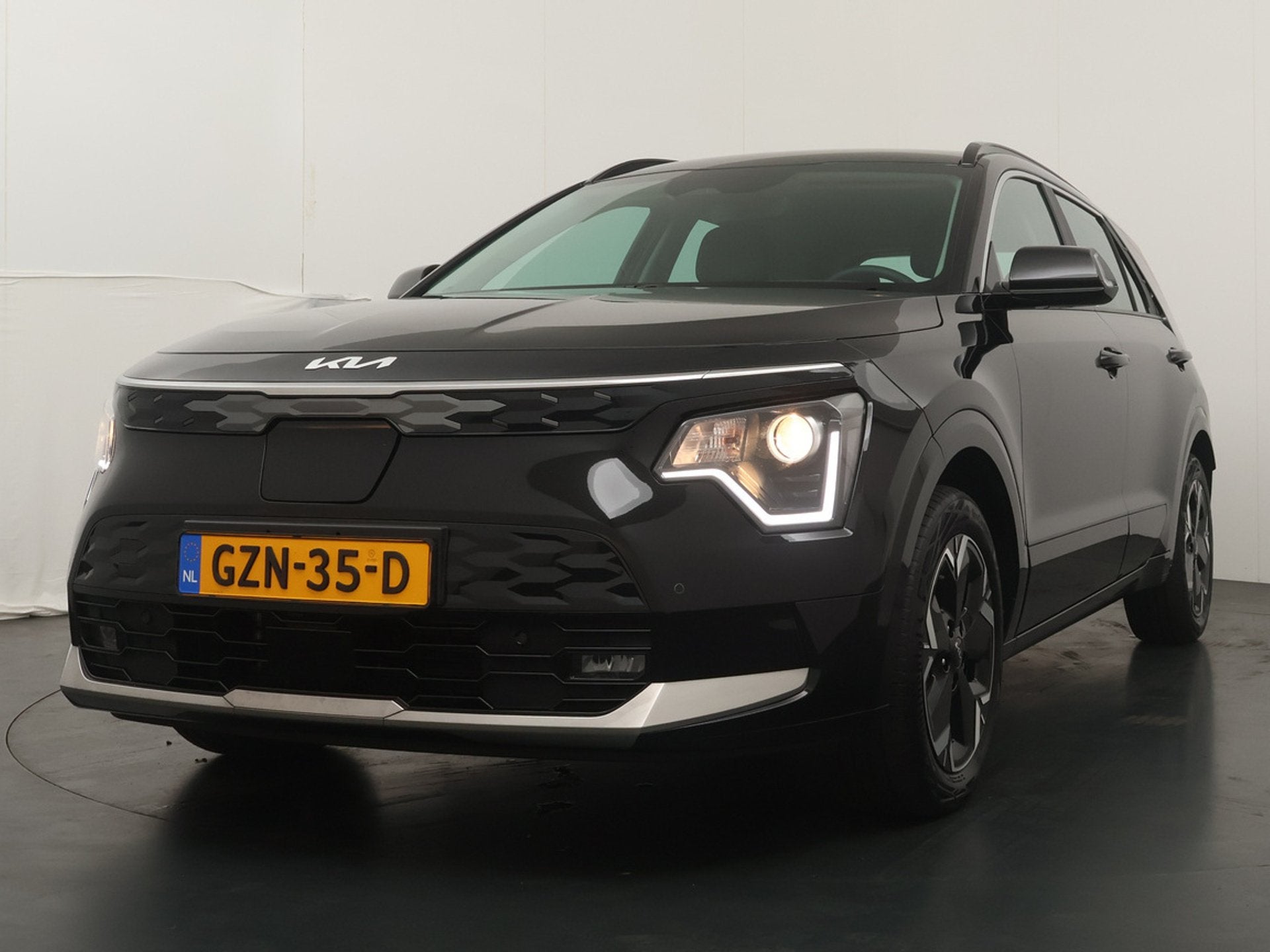 Kia Niro EV DynamicLine 64.8 kWh Airco - Apple Carplay/Andro, Auto's, Met garantie (alle), 1657 kg, Leder en Stof, Zwart