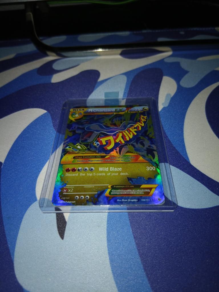 M charizard ex, Ophalen of Verzenden, Nieuw, Losse kaart, Foil