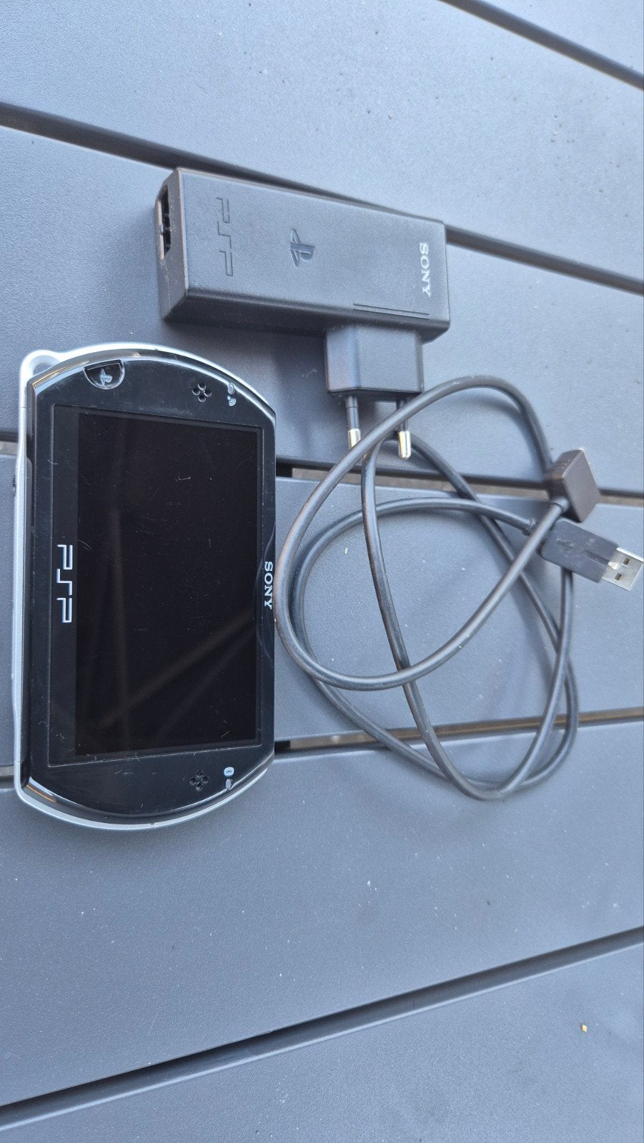 Sony PSP 1004 + Originele oplader +11 games op geheugenkaart, Met games, Zwart, Ophalen of Verzenden, Zo goed als nieuw