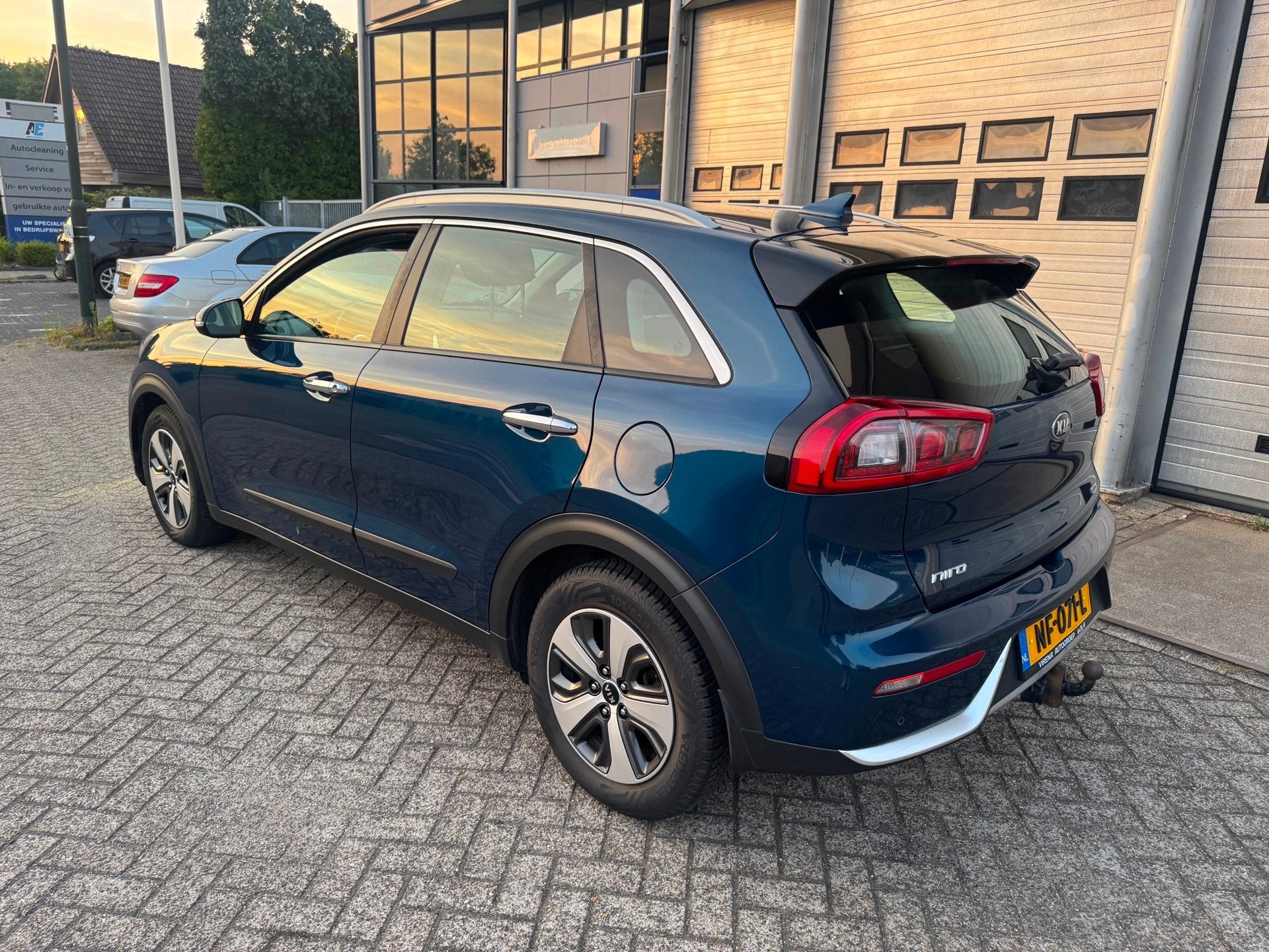 Kia Niro 1.6 GDi Hybrid First Edition Camera,Trekhaak, Auto's, Parkeersensor, Gebruikt, Euro 6, Blauw