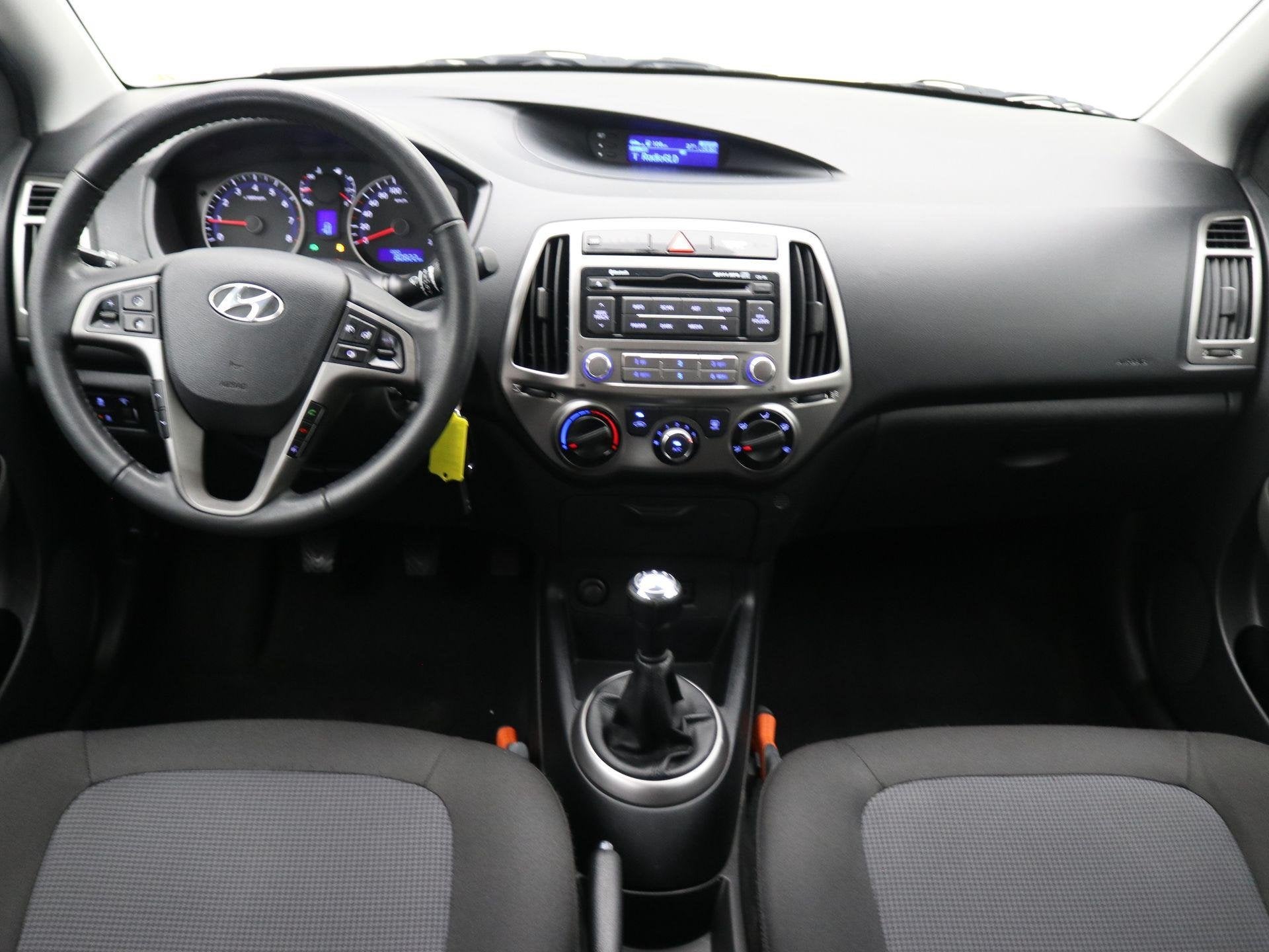 Hyundai i20 1.2i Go! / Airco / Cruise Control / Bluetooth /, Auto's, Euro 5, Gebruikt, 31 €/maand, 4 cilinders