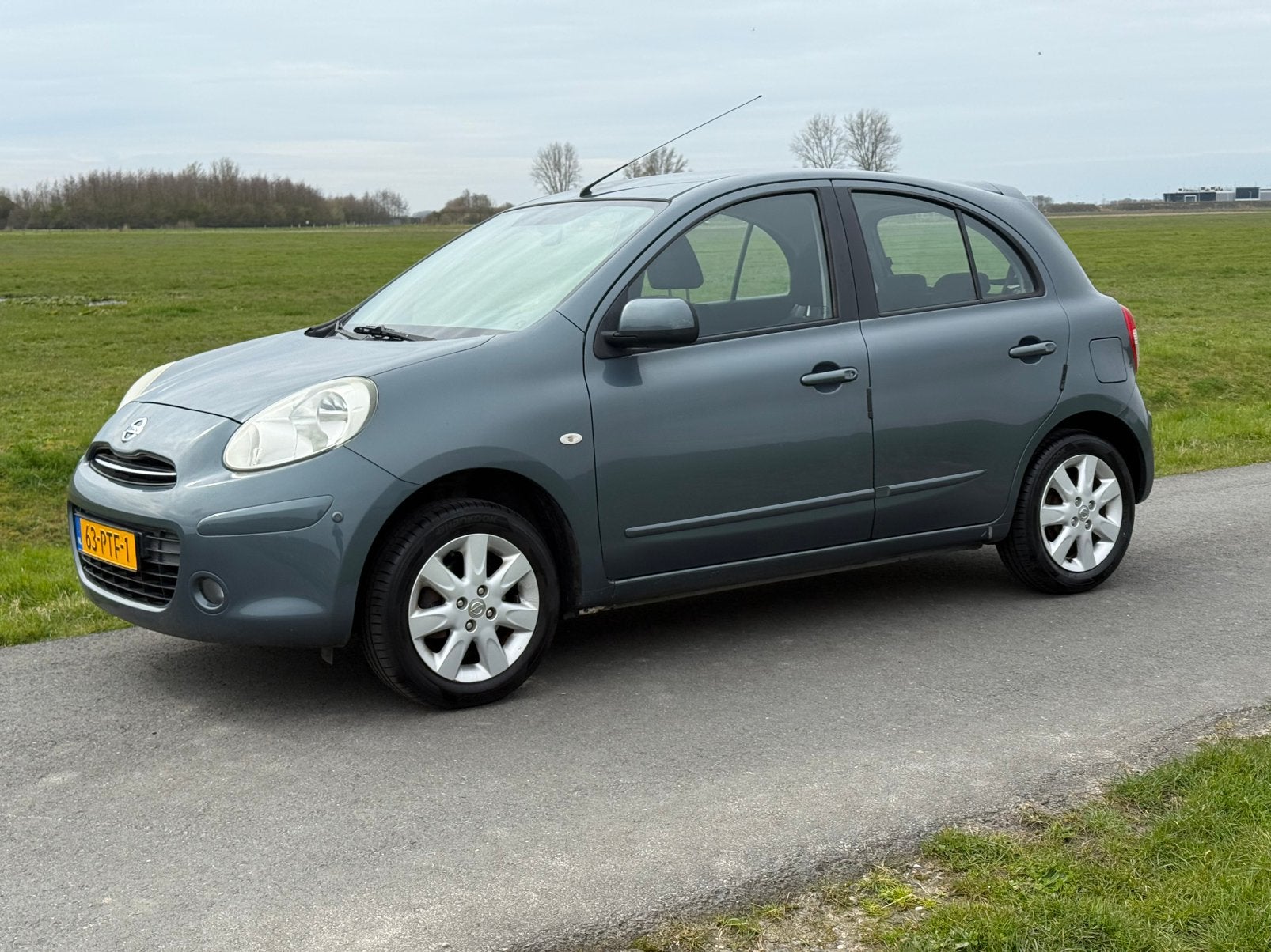 Nissan Micra 1.2 59KW 5DR 2011 Grijs Airco, Auto's, Voorwielaandrijving, 31 €/maand, 1198 cc, Origineel Nederlands