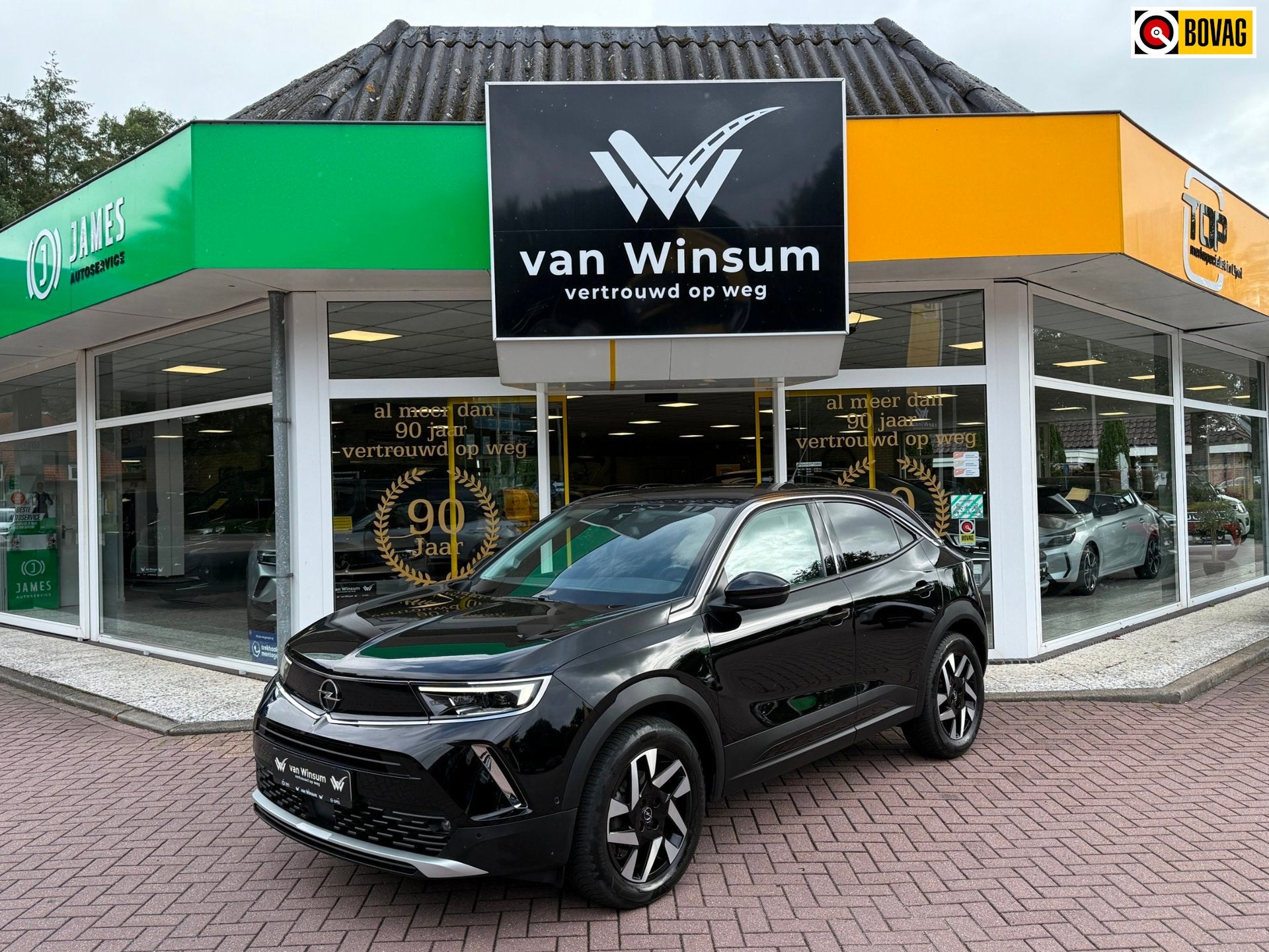 Opel Mokka 1.2 Turbo Elegance Automaat | Navigatie | Trekhaa, Auto's, Gebruikt, 1199 cc, Zwart, 3 cilinders