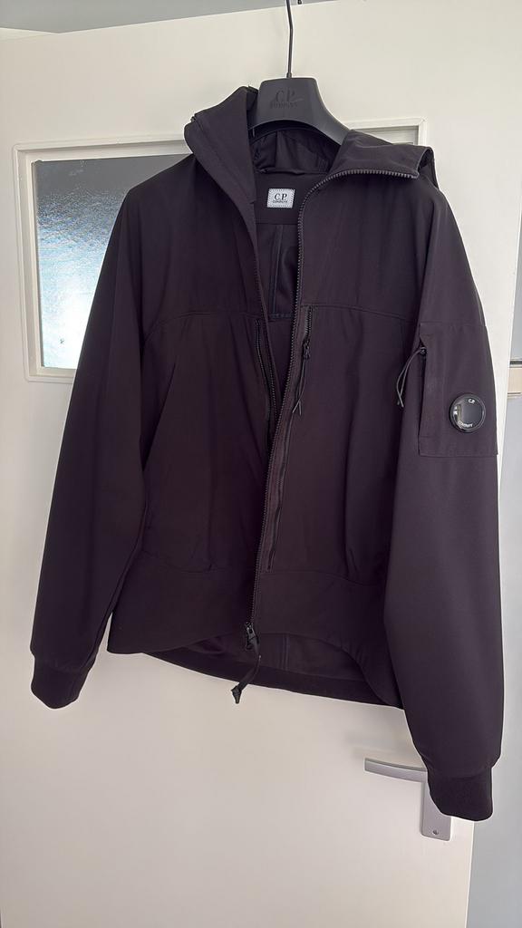 C.P. Company Soft Shell Jas Zwart - Maat L, Ophalen of Verzenden, Zo goed als nieuw, Maat 52/54 (L), Zwart