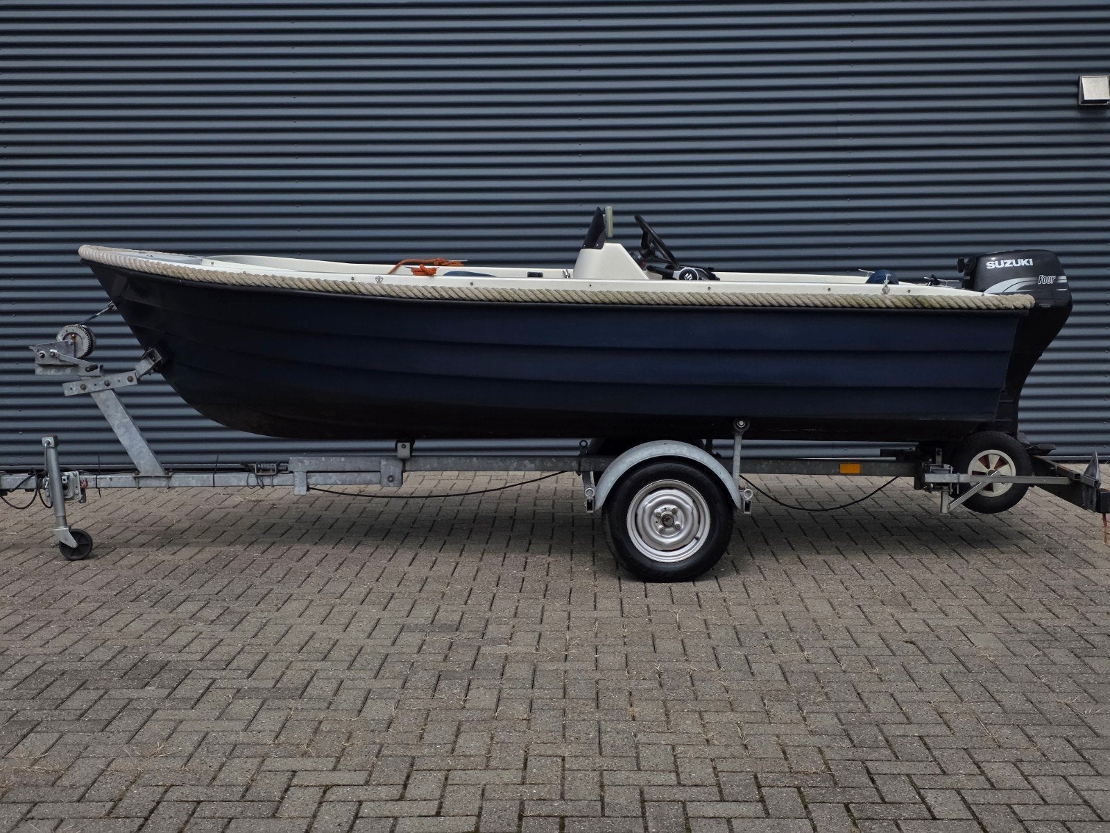 Stijlvolle consoleboot met Suzuki buitenboordmotor, Benzine, Overige merken, Gebruikt, Buitenboordmotor