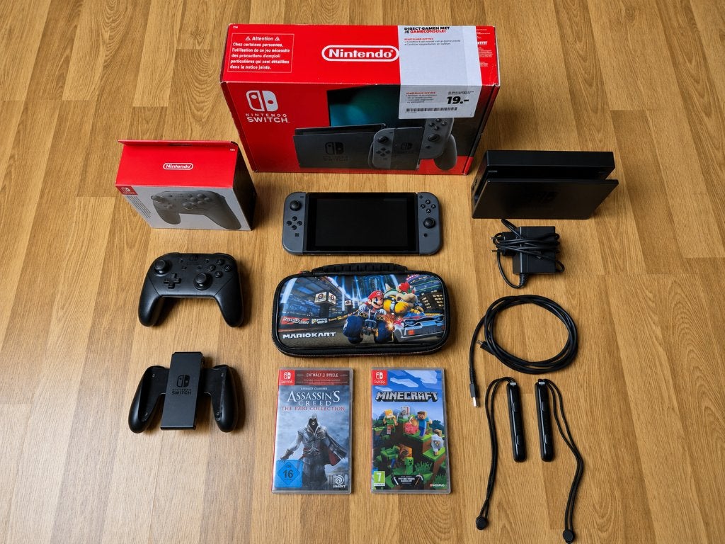 Nintendo Switch V2 met 2 spellen, alle accessoires + extra!, Spelcomputers en Games, Switch 2019 Upgrade, Met 2 controllers, Ophalen of Verzenden