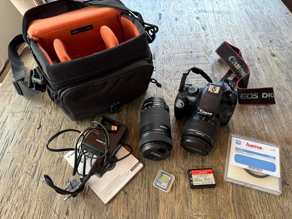 Canon EOS 1100D met 2 lenzen, extra batterij en tas, Ophalen of Verzenden, Zo goed als nieuw