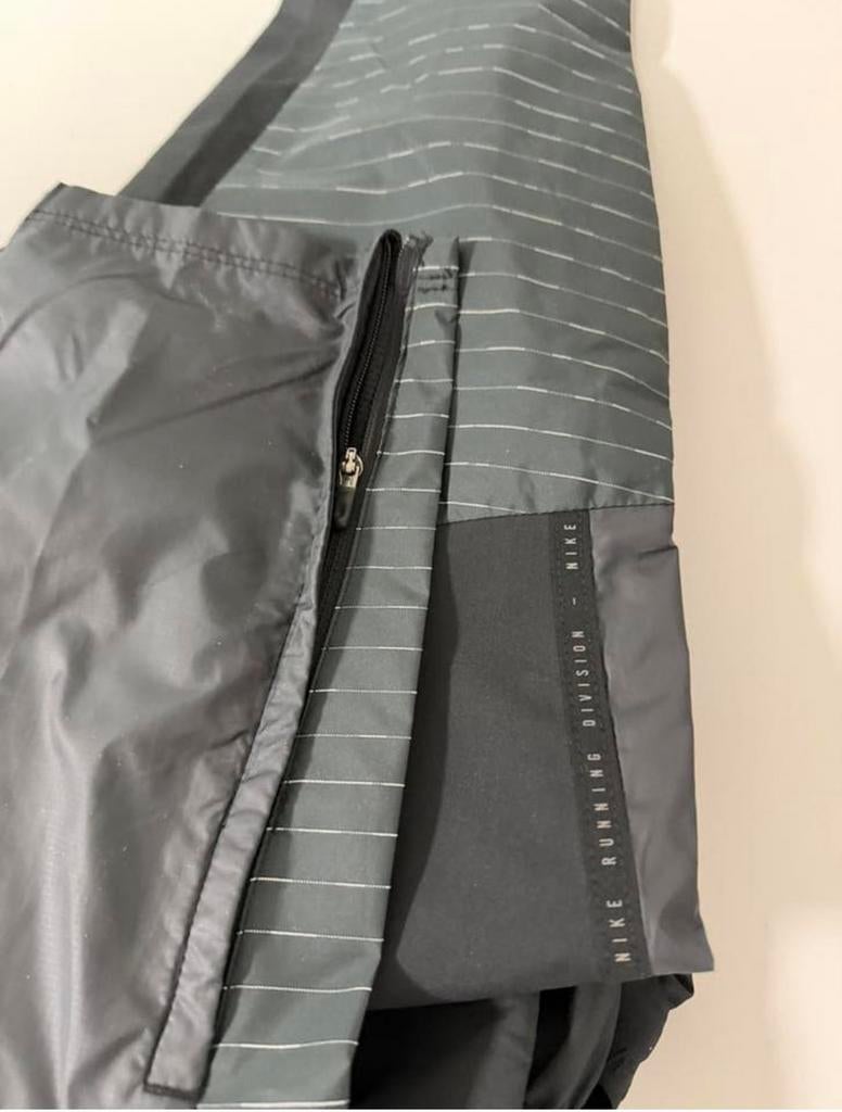 Nike Storm-FIT Running Division broek maat L waterproof zgan, Heren, Regenbroek, Ophalen of Verzenden, Zo goed als nieuw