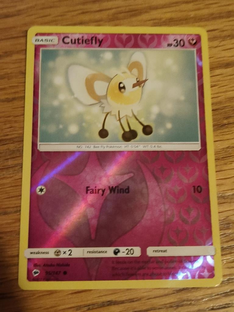 Cutiefly reverse holo 095/147 burning shadows, Ophalen of Verzenden, Zo goed als nieuw, Losse kaart, Foil
