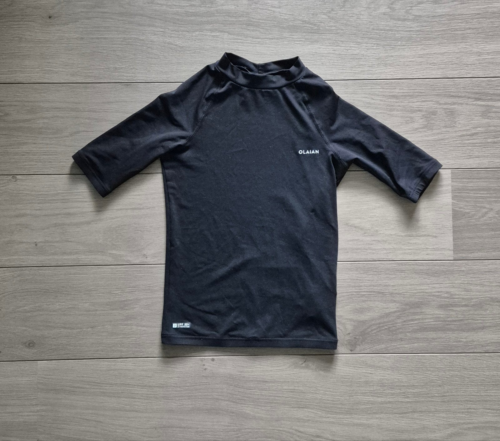 Olaian uv shirt uv-shirt zwart 131-140cm 8-9 jaar zgan, Jongen of Meisje, Ophalen of Verzenden, Zo goed als nieuw, Zwem-accessoire