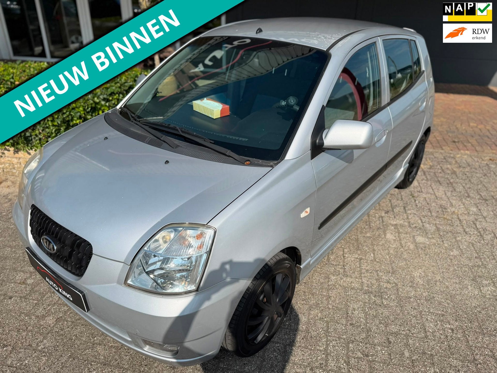 Kia Picanto 1.0 Bling AIRCO/PDC/SCHERM/TREK APK+NAP, Auto's, Voorwielaandrijving, Stof, Zwart, 4 cilinders