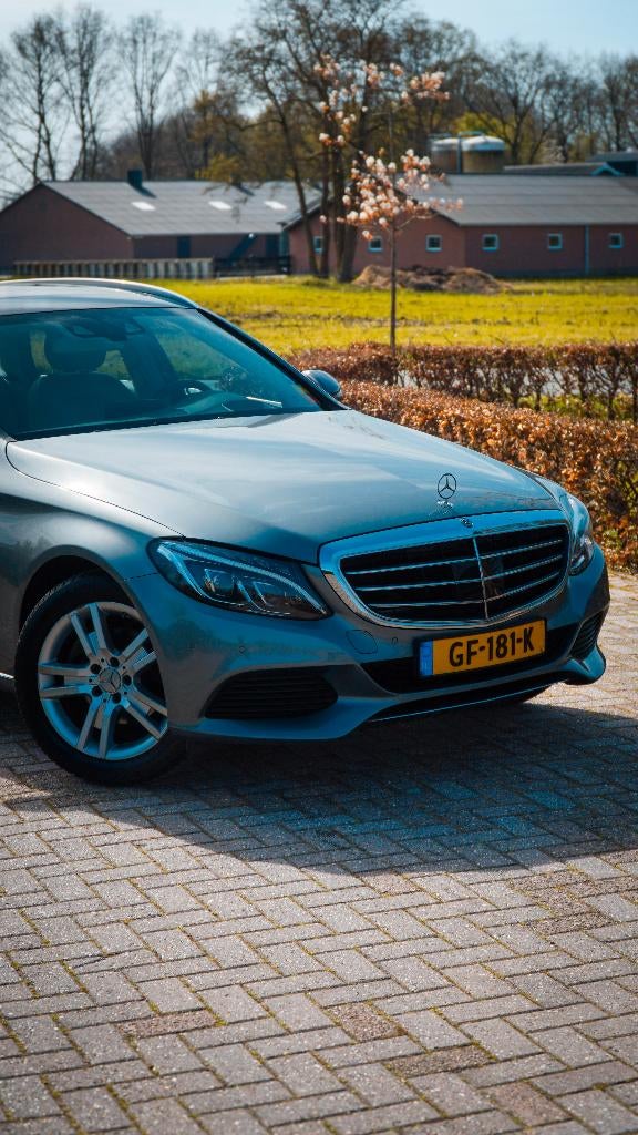 Mercedes-Benz C-Klasse C180 Estate PANO, HUD, ACC, Automaat, 745 kg, Achterwielaandrijving, 1800 kg