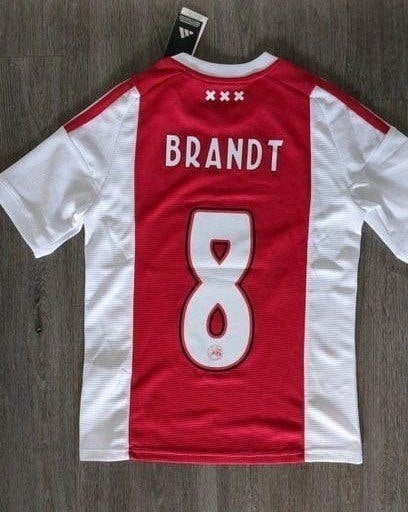 Nieuw - 164 Officieel Ajax thuisshirt 2026/2027 - Brandt #8, Ophalen of Verzenden, Nieuw, Shirt