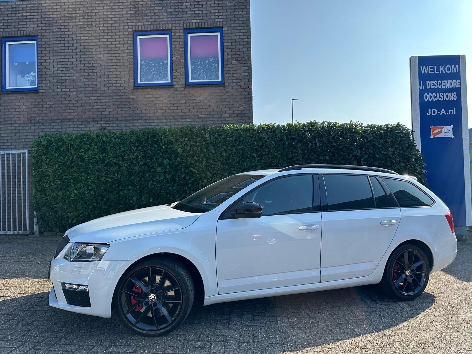 Skoda Octavia Combi 2.0 TSI RS Climate C, Cruise C, RS Sport, Auto's, Skoda, Gebruikt, Zwart, 4 cilinders, Leder en Stof