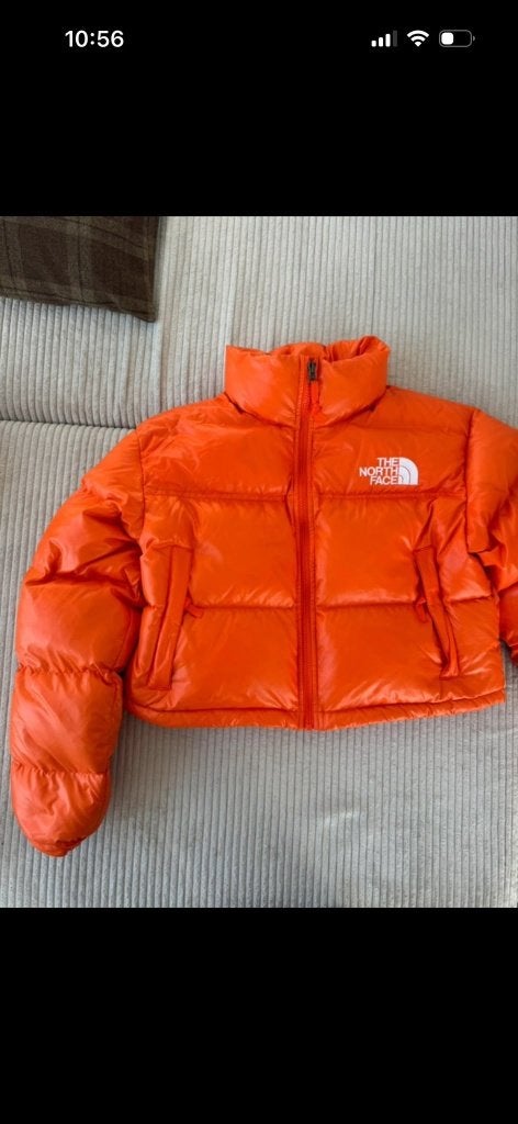 The North Face donsjas, cropped, maat M kleine beschadiging, Maat 38/40 (M), Verzenden, Oranje, Zo goed als nieuw