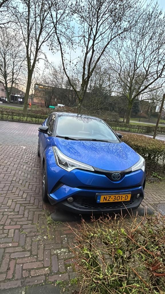 Toyota C-HR 1.8 Hybrid 122pk CVT 2017 Blauw, Auto's, Toyota, Stof, 725 kg, 4 cilinders, Blauw