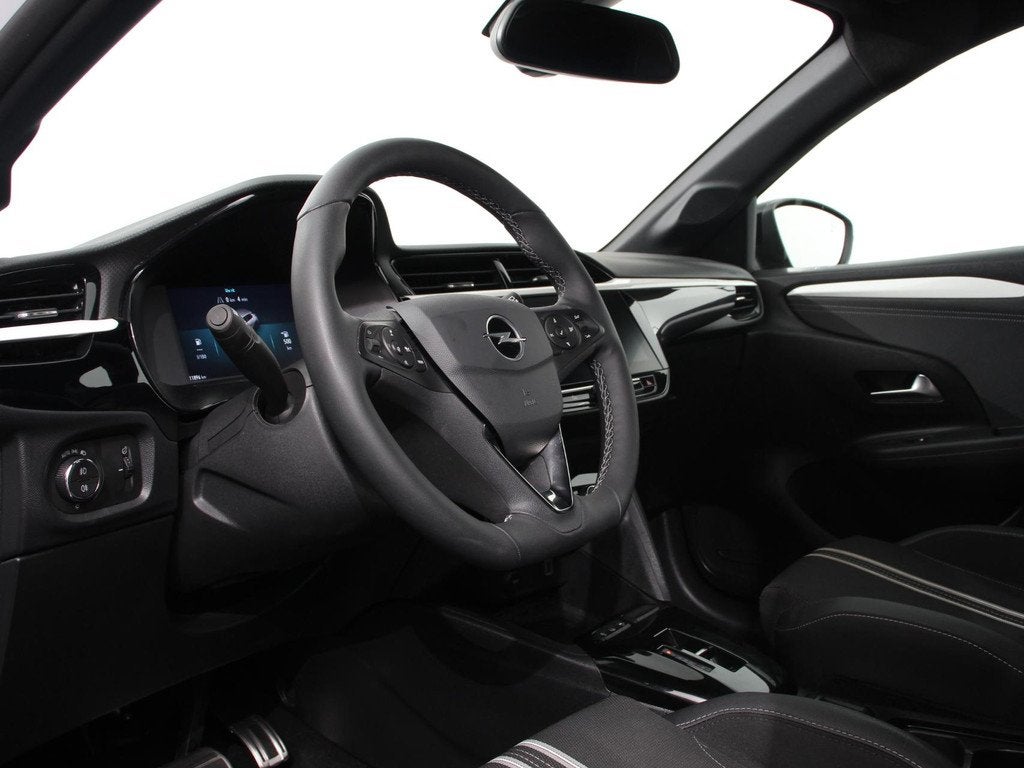 Opel Corsa 1.2 Turbo 136pk Automaat Hybrid GS Line Navigatie, Auto's, Opel, Stof, Gebruikt, 610 kg, Wit