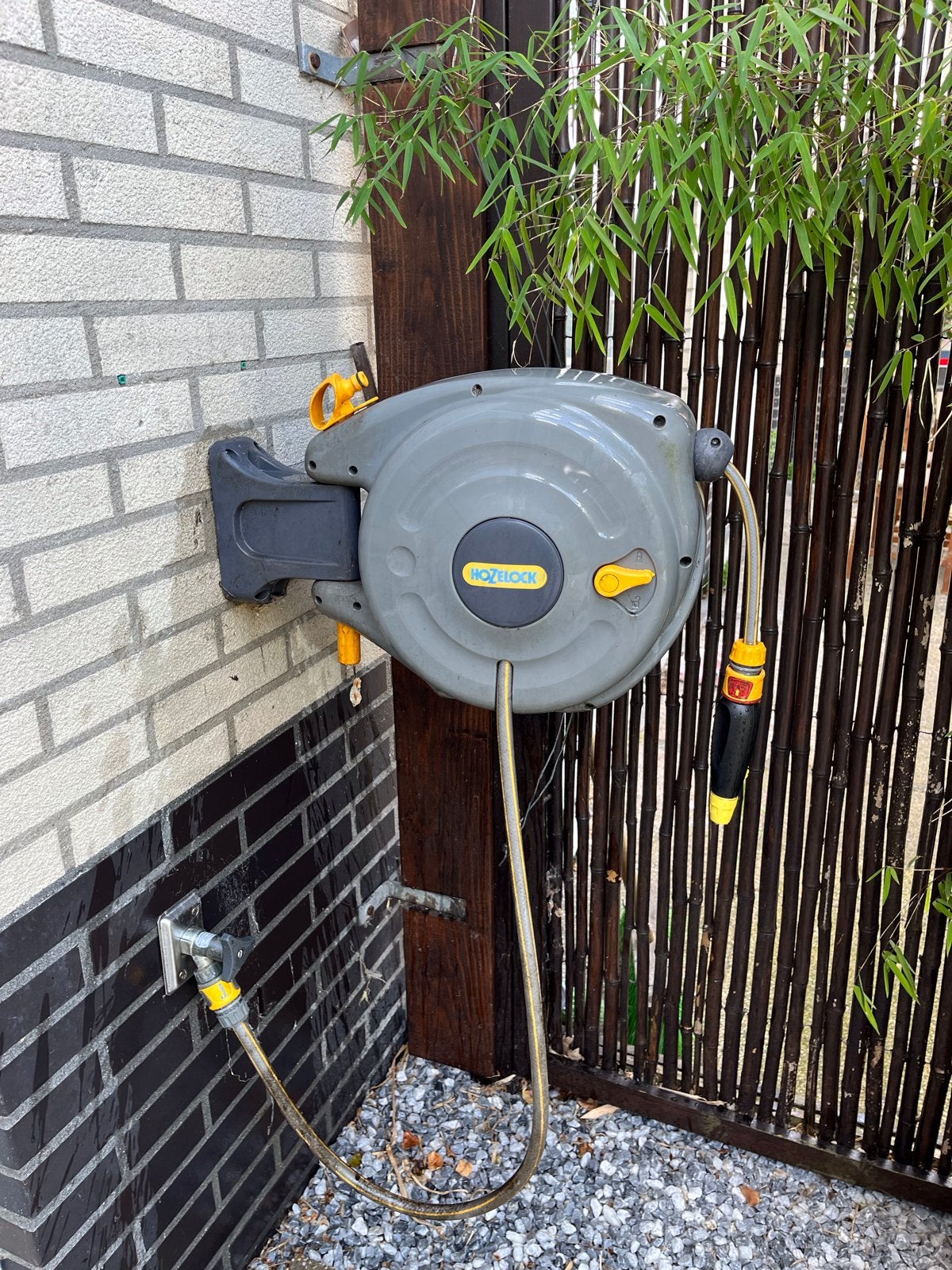 Hozelock wandslanghaspel 10 meter - Compleet en z.g.a.n., Ophalen, Gebruikt, Tuinslanghaspel