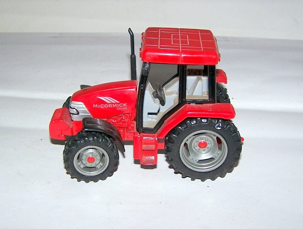 Mooi McCormick CX100 tractormodel. Nwst., Ophalen of Verzenden, Nieuw, Tractor of Landbouw