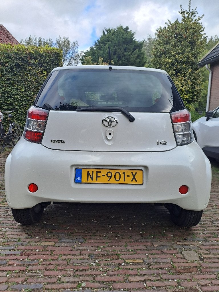 Toyota IQ 1.0 2009 Wit, Stof, 4 stoelen, Bruin, Handgeschakeld