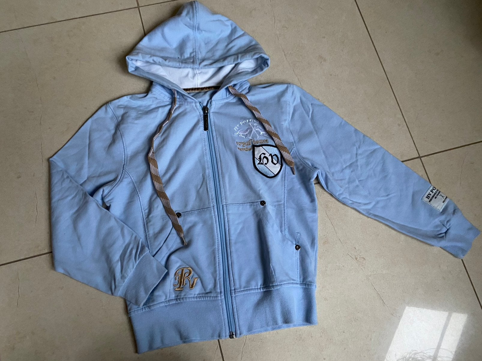HV polo dun vest licht blauw 122/128, Ophalen of Verzenden, Zo goed als nieuw, Meisje, Trui of Vest