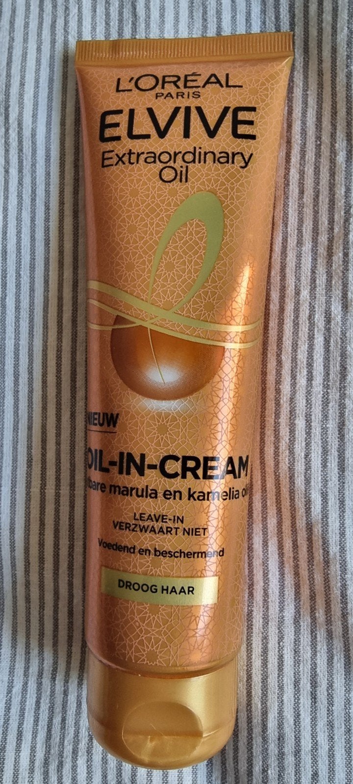 L'Oréal oil in cream, Sieraden, Tassen en Uiterlijk, Uiterlijk | Haarverzorging, Ophalen of Verzenden, Zo goed als nieuw, Gel, Wax, Haarlak of Mousse