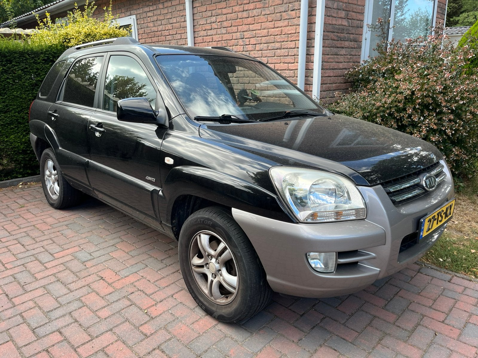 Kia Sportage 2.7 4WD AUT 2007 Zwart, Auto's, Automaat, Stoelverwarming, 2656 cc, Zwart