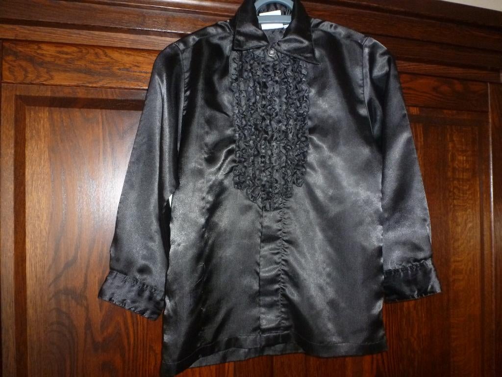 1 mooie zwarte ruches, disco blouse lange mouwen maat 128, Kinderen en Baby's, Carnavalskleding en Verkleedspullen, Ophalen of Verzenden