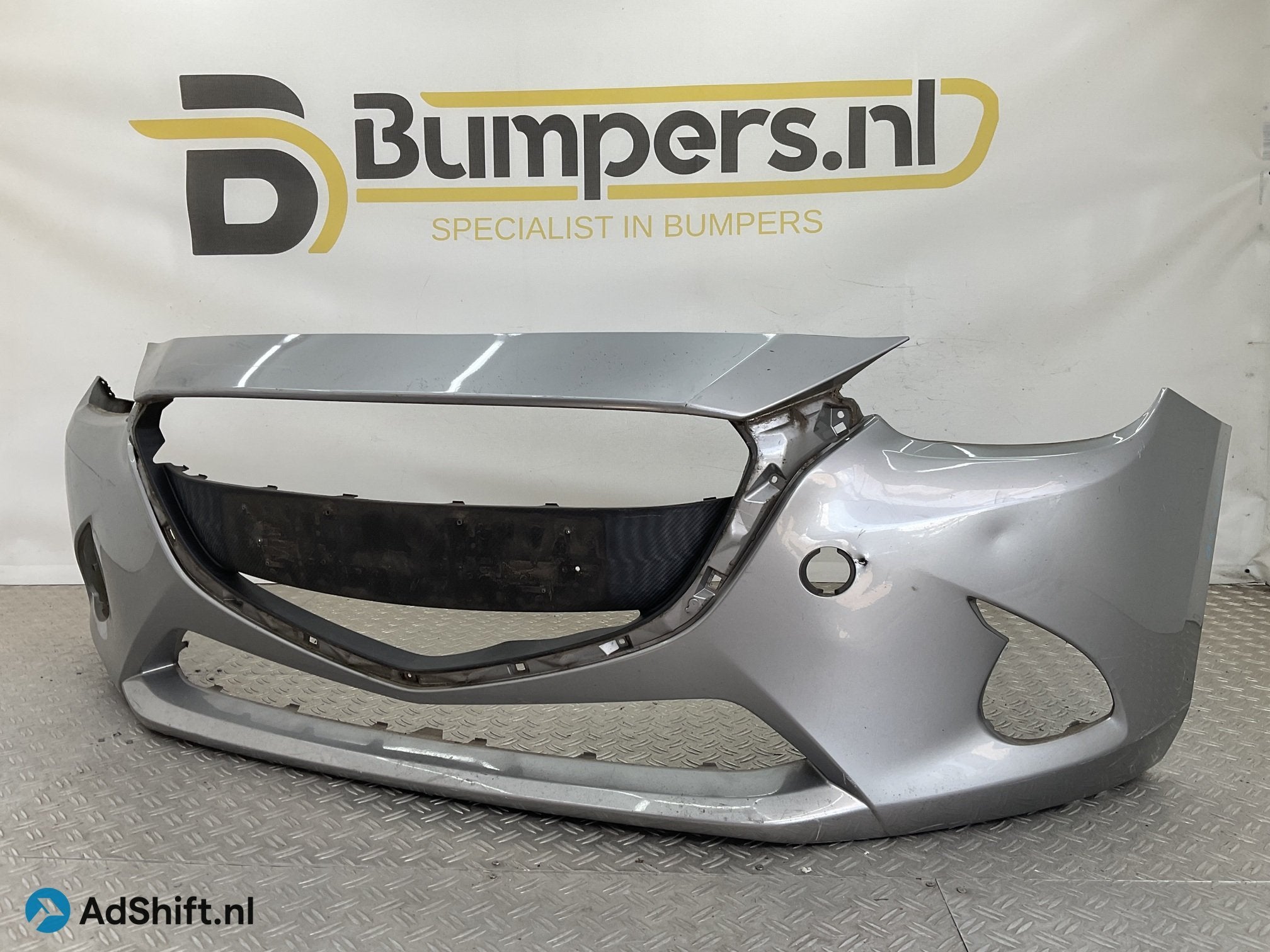 Bumper Mazda 2 2007-2014 DB5J-50031 Voorbumper B4-23261, Bumper