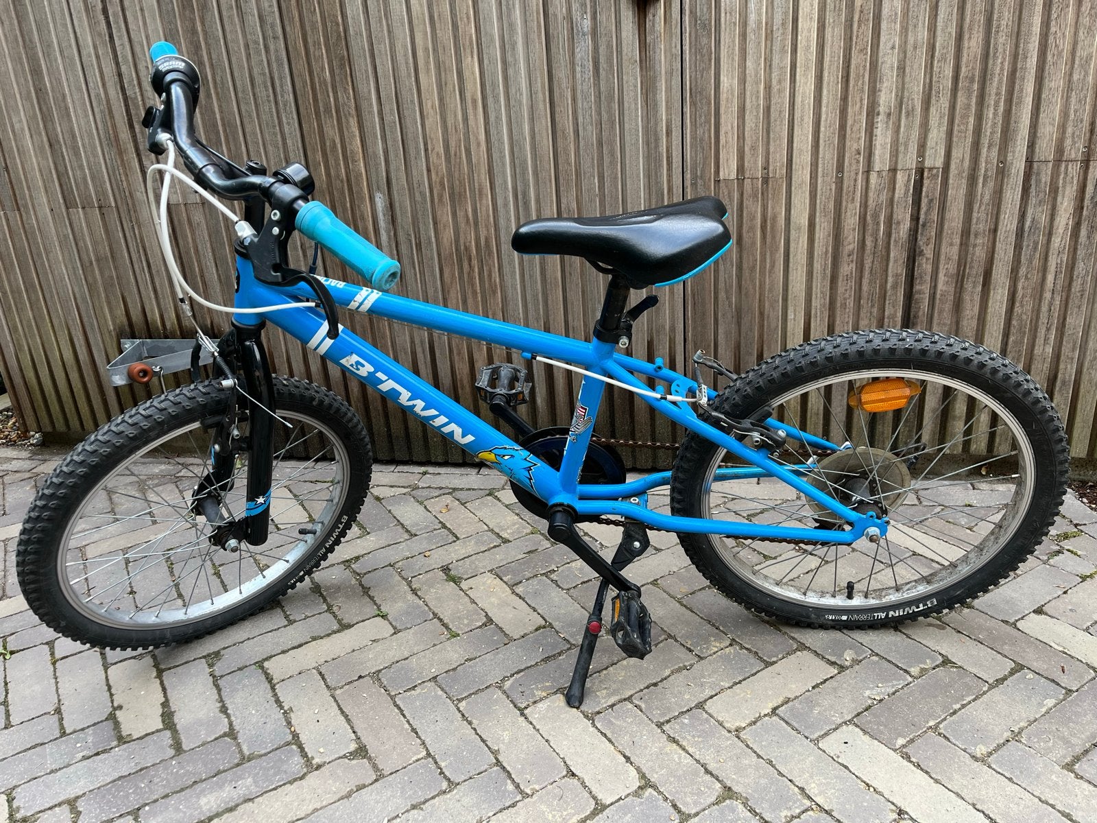 Blauwe B'Twin Racingboy 320 kinderfiets - 20 inch, Ophalen, Gebruikt, Velgrem, Versnellingen