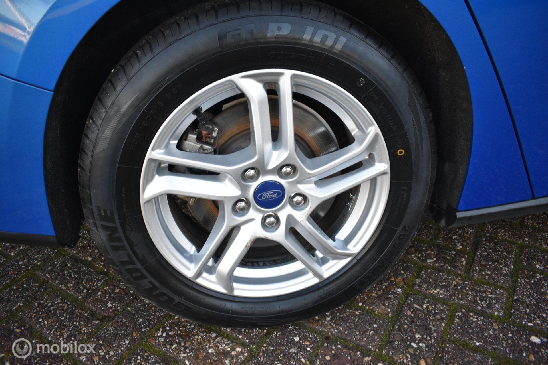 Ford Focus Wagon 1.0 EcoBoost Hybrid Trend Edition|Navi|LED!, Auto's, Stof, Euro 6, Blauw, Origineel Nederlands