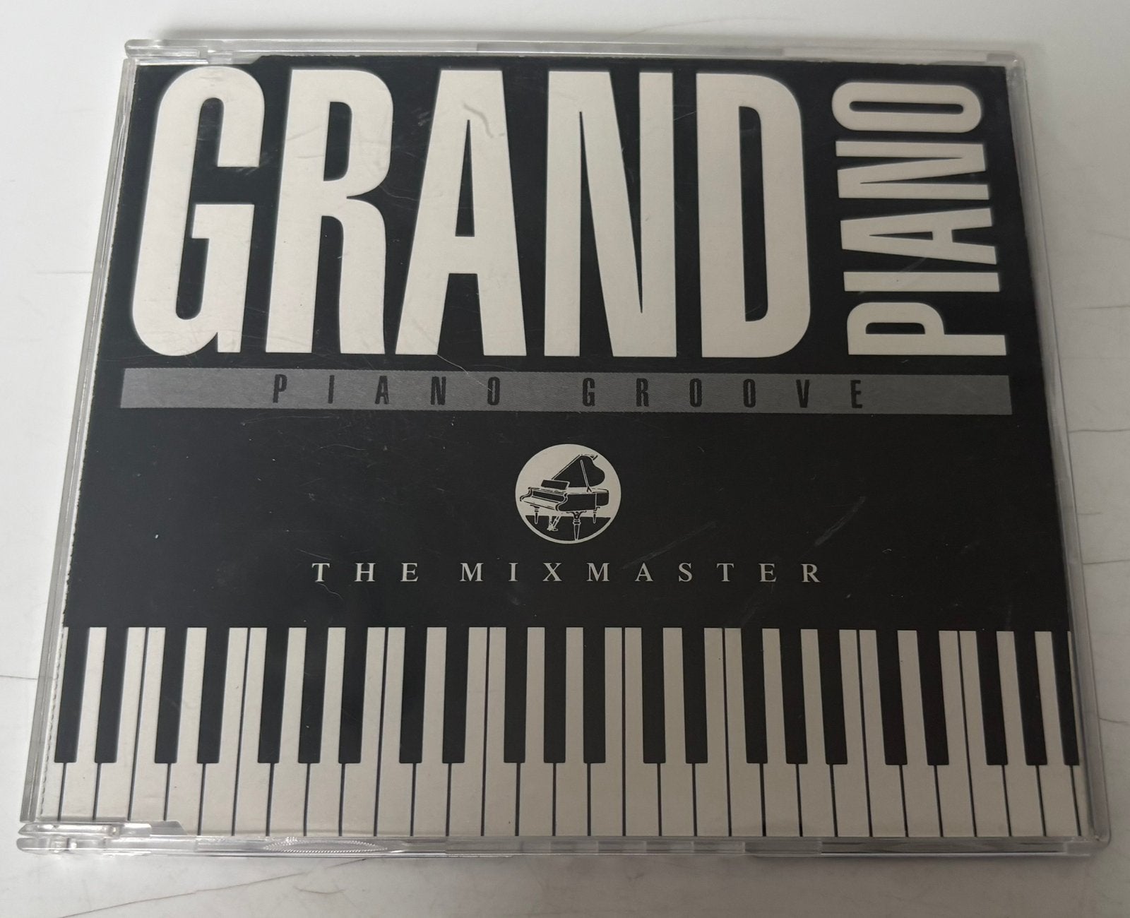Grand piano - The mixmaster (nieuwstaat), Ophalen of Verzenden, Zo goed als nieuw, Pop