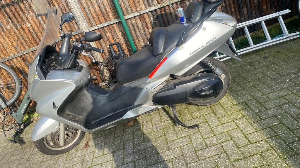 Honda silver wing, Fietsen en Brommers, Ophalen of Verzenden, Zo goed als nieuw