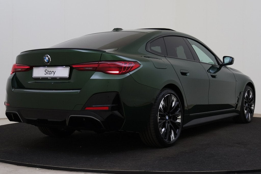 BMW i4 eDrive40 M Sport / Schuif-kanteldak / M Sportstoelen, Auto's, BMW, Achterwielaandrijving, Met garantie (alle), 2020 kg