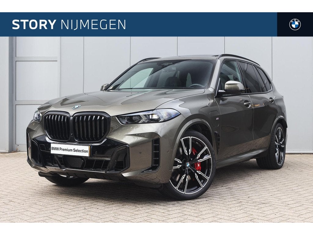 BMW X5 xDrive50e M Sport Automaat / Panoramadak / Trekhaak /, Auto's, 2395 kg, Met garantie (alle), Bedrijf, 489 pk
