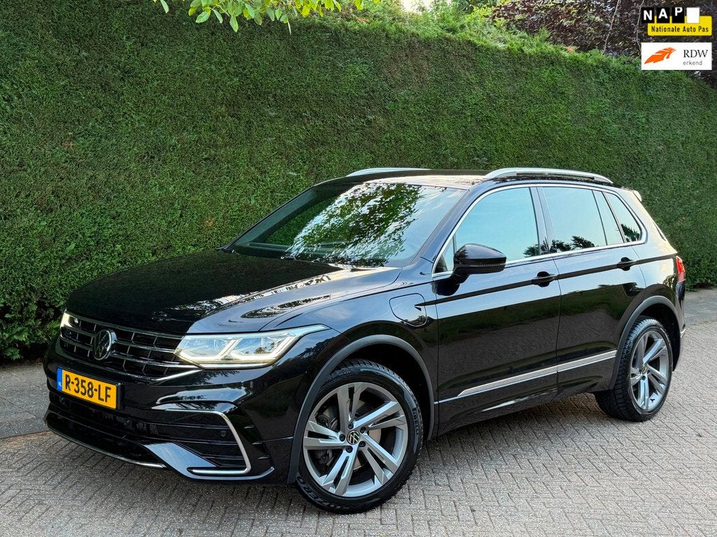 Volkswagen Tiguan 1.4 TSI eHybrid R-Line GARANTIE/1eEIGENAAR, Auto's, 1716 kg, Stof, Gebruikt, 4 cilinders