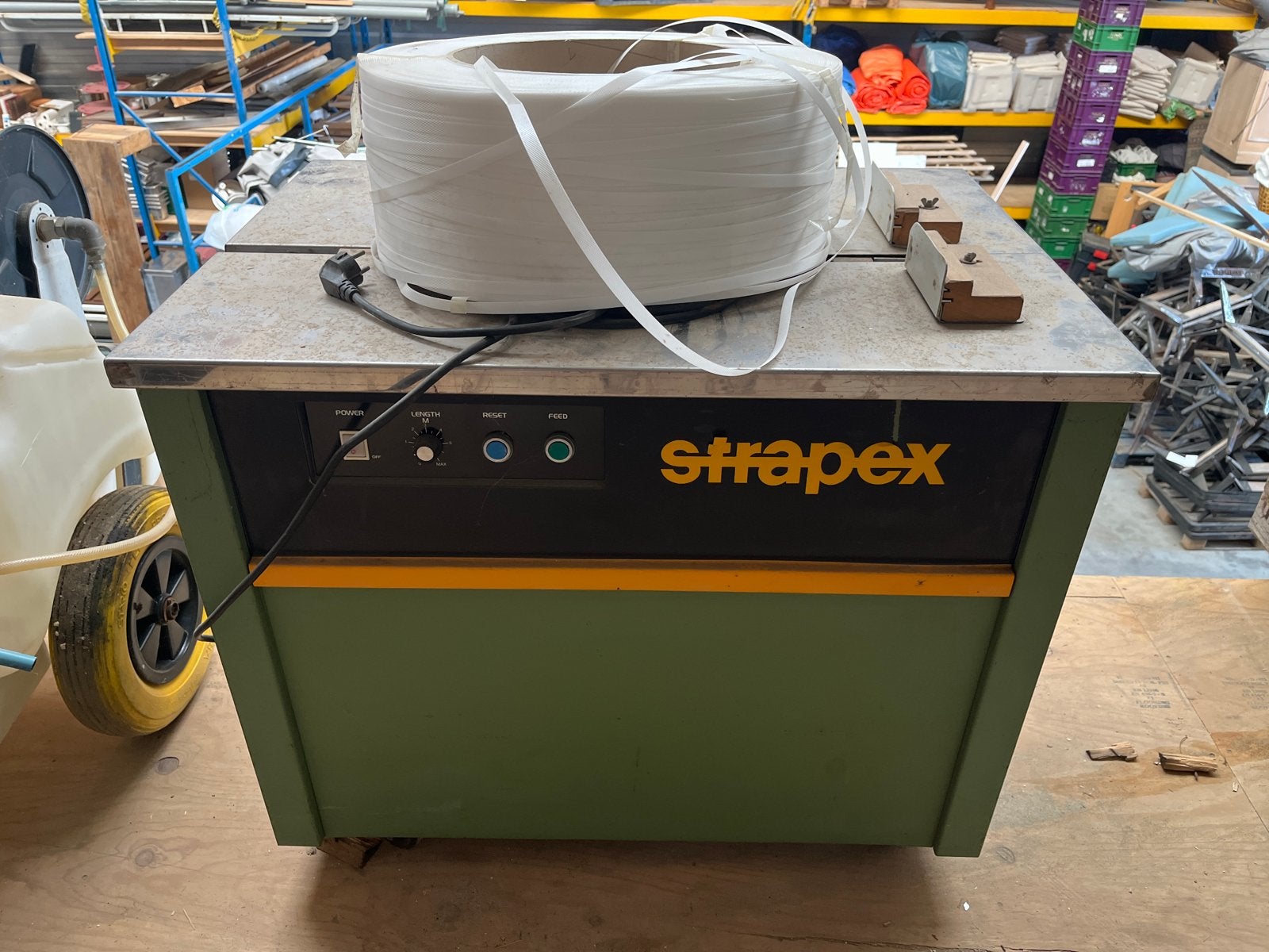 Strapex Mini-AT omsnoeringsmachine, Ophalen