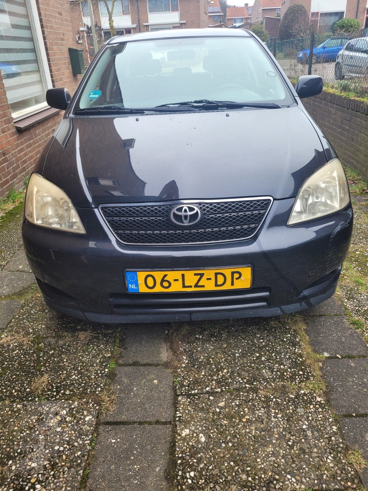 Toyota Corolla 1.6 Vvt-i 5DR Linea SOL 2003 Zwart, Auto's, Voorwielaandrijving, 4 cilinders, Corolla, Grijs
