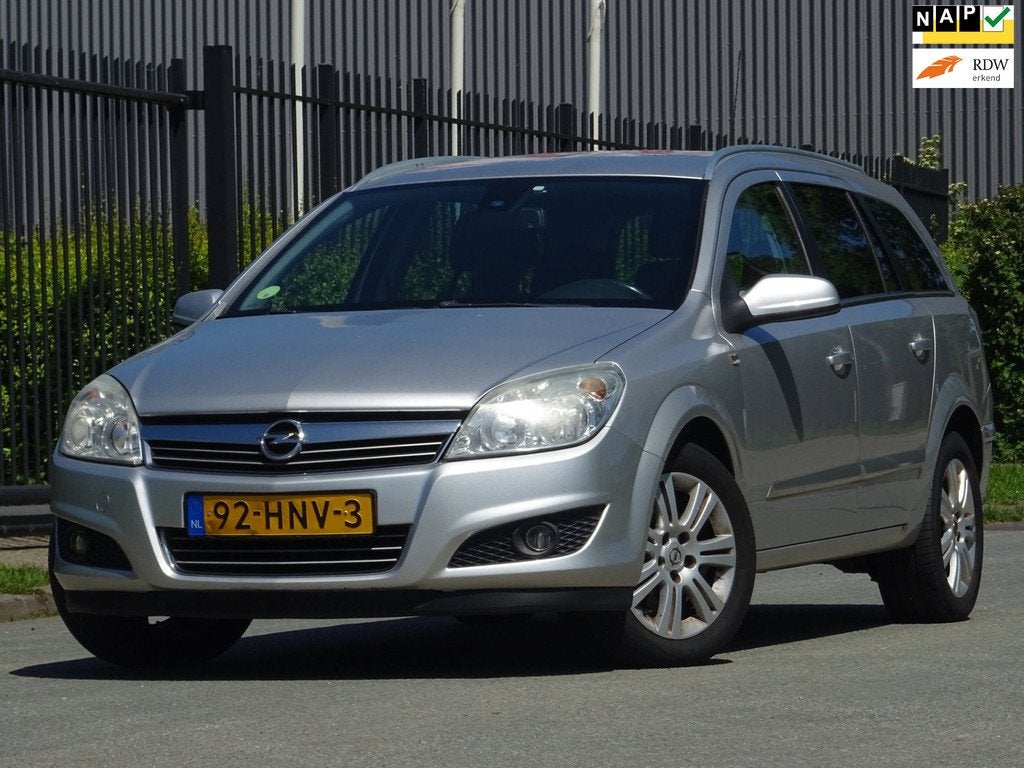 Opel Astra Wagon 1.6 Executive NAP/LEER/NAVI/AC/CRUISE/APK, Voorwielaandrijving, Gebruikt, Zwart, 4 cilinders
