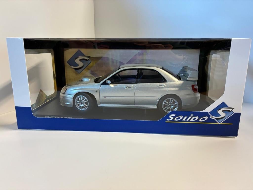 27680: Subaru Impreza WRX STi - 2003 - Solido 1:18, Hobby en Vrije tijd, Modelauto's | 1:18, Solido, Auto, Solido, Nieuw