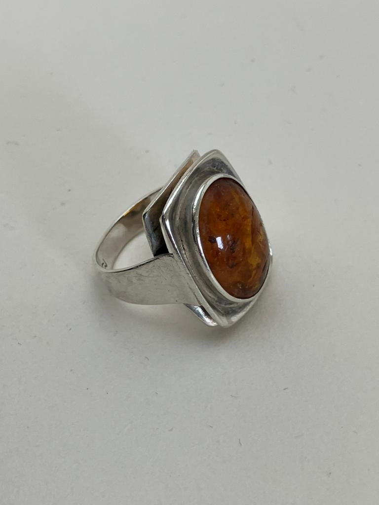Zilveren ring met barnsteen, 18 tot 19, Ophalen of Verzenden, Zo goed als nieuw, Dame