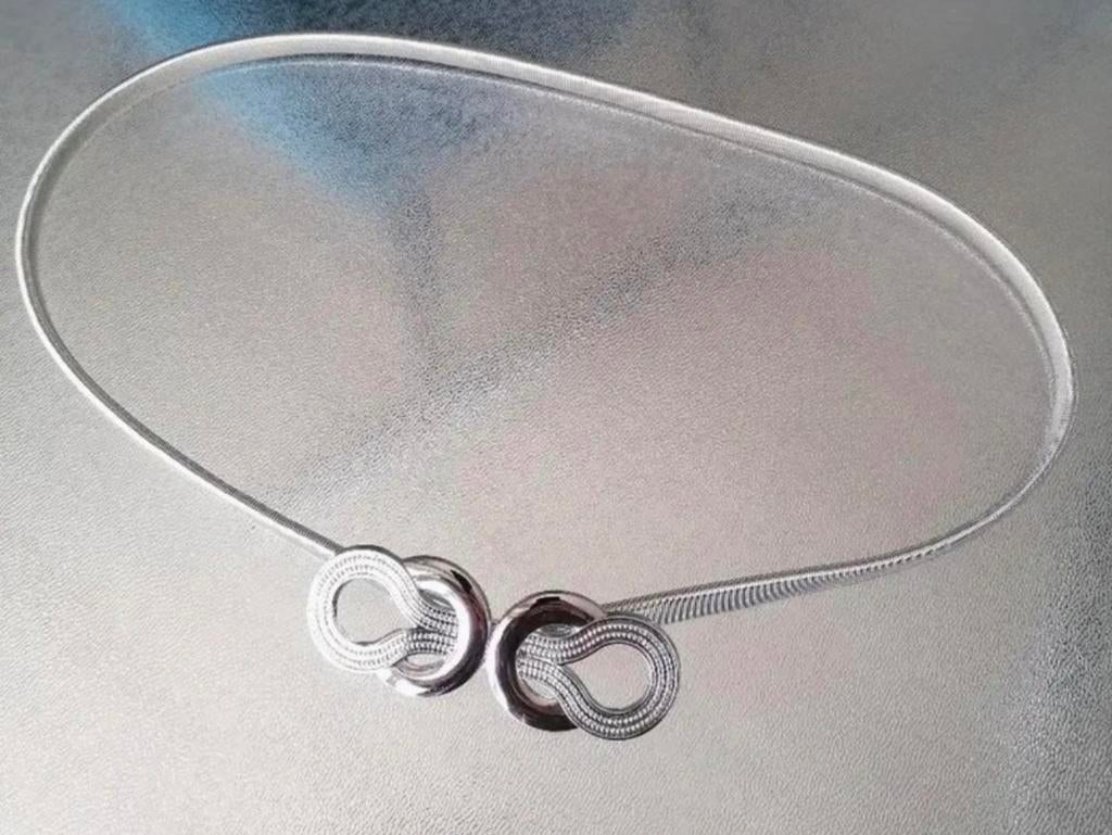 Nieuwe metalen zilverkleurige elastische riem, Minder dan 3 cm, Nieuw, Tailleriem, Ophalen of Verzenden