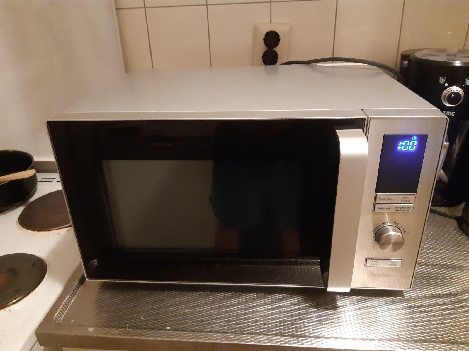 Zo goed als nieuwe vrijstaande combimagnetron, Ophalen