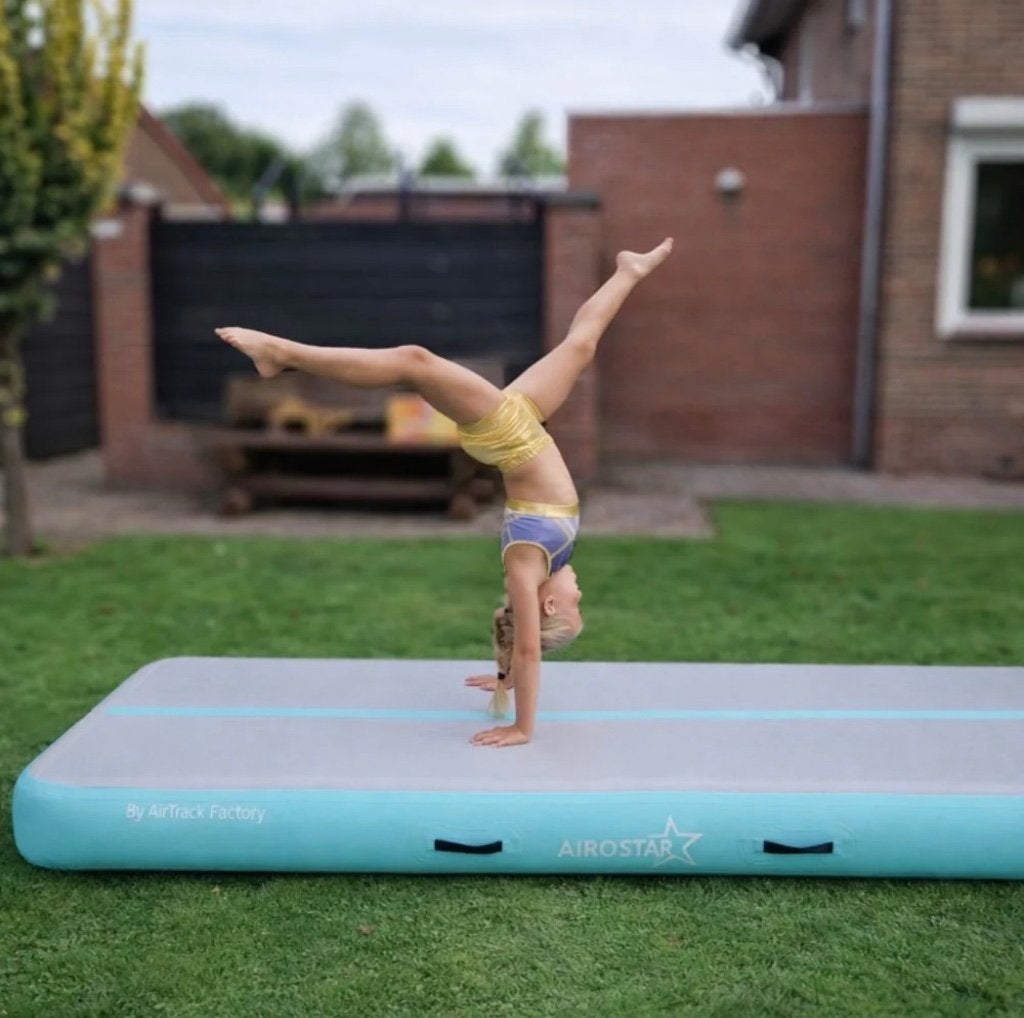 Airostar Airtrack 5 meter turquoise, Kindermaat 122 t/m 140, Ophalen of Verzenden, Zo goed als nieuw, Materiaal