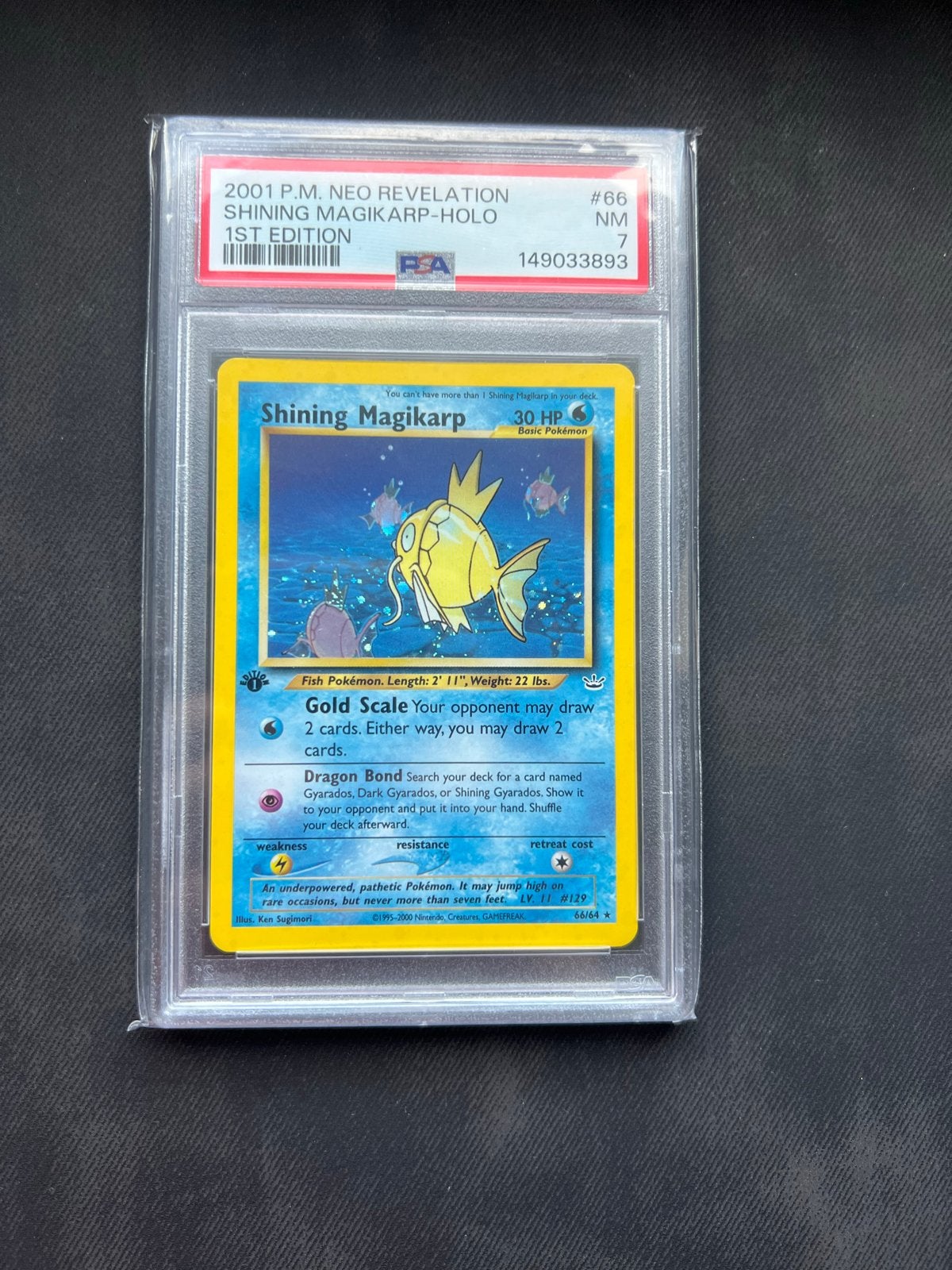 Shining Magikarp 1st Edition PSA 7 Neo Revelation Pokémon, Hobby en Vrije tijd, Ophalen of Verzenden, Zo goed als nieuw, Losse kaart