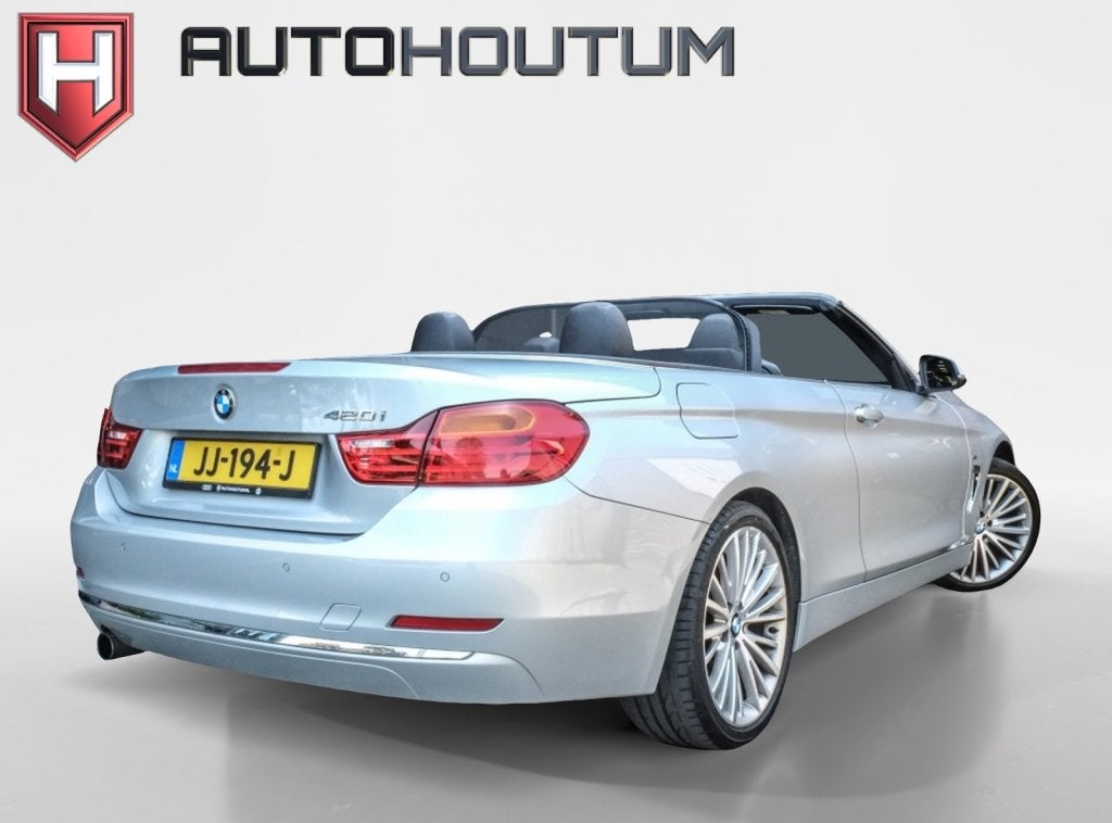 BMW 4 Serie Cabrio 420i High Executive (bj 2016), Auto's, Dealer onderhouden, 15 km/l, Gebruikt, Cabriolet