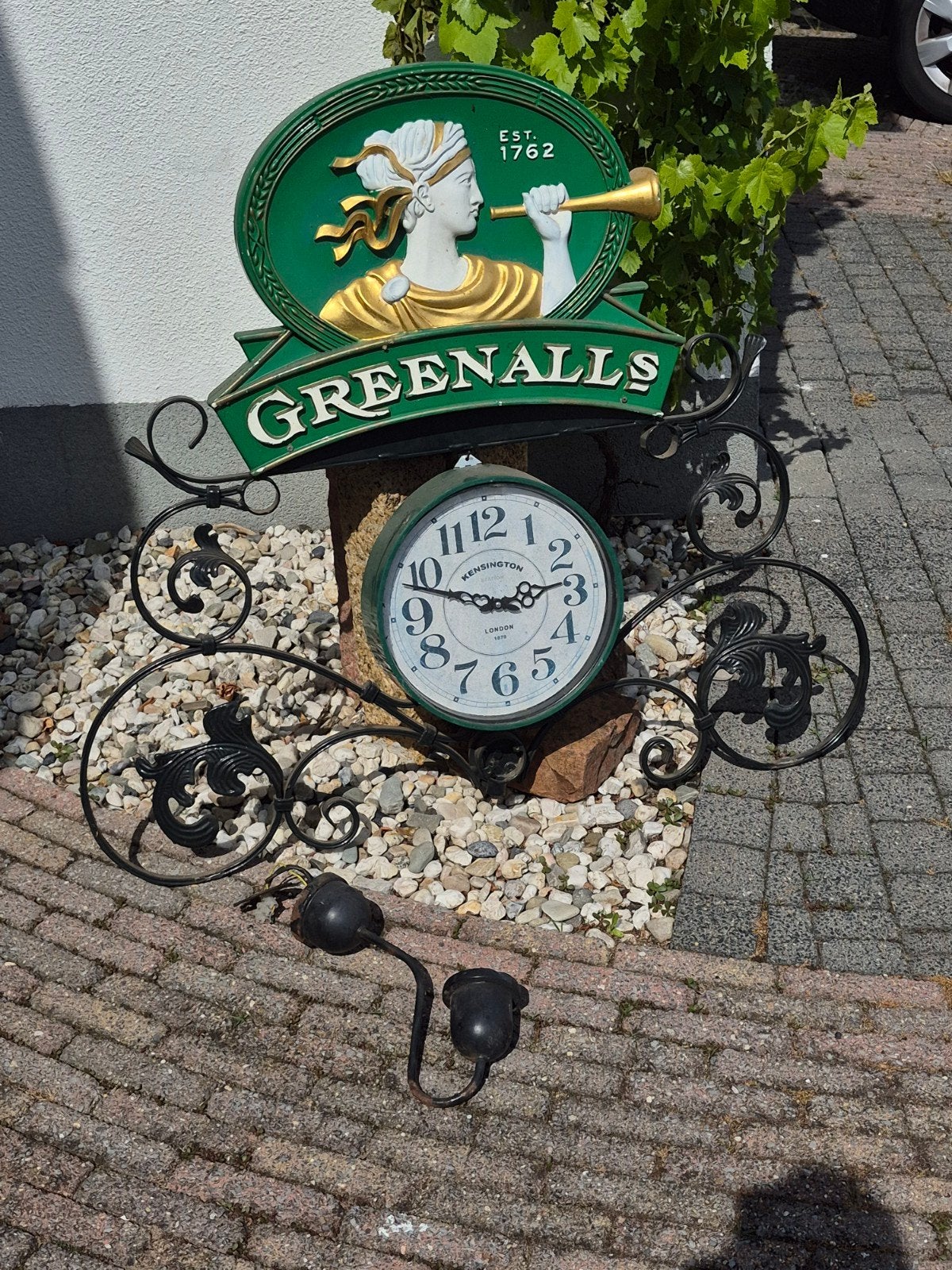 Greenall's Engelse Pub bord met Klok Mancave, Ophalen