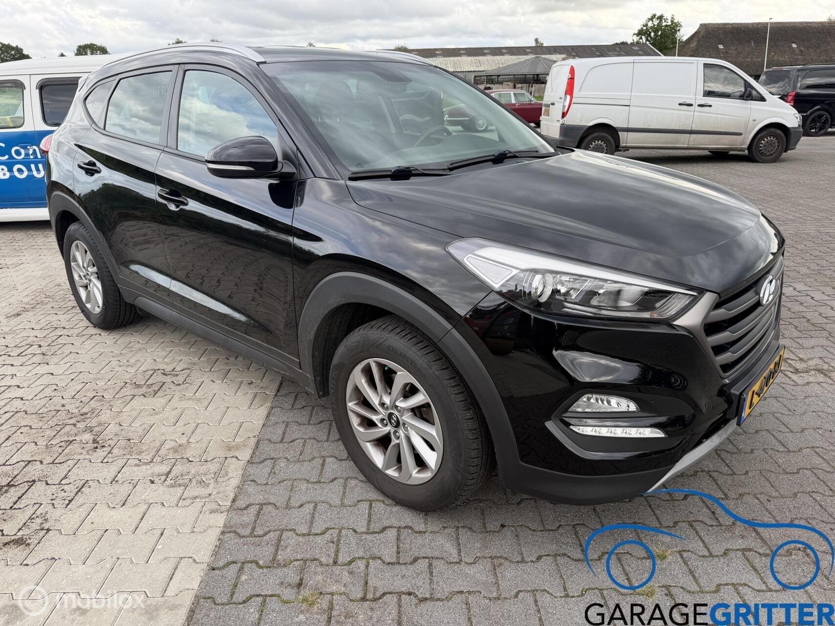 Hyundai Tucson 1.6 T-GDi Comfort, Gebruikt, 4 cilinders, Zwart, 14 km/l