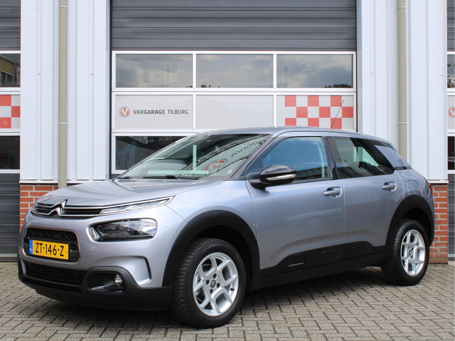 Citroën C4 Cactus 1.2 Puretech 110PK Business /NAVI/PDC/Cru, Auto's, Stof, Gebruikt, Euro 6, 1199 cc